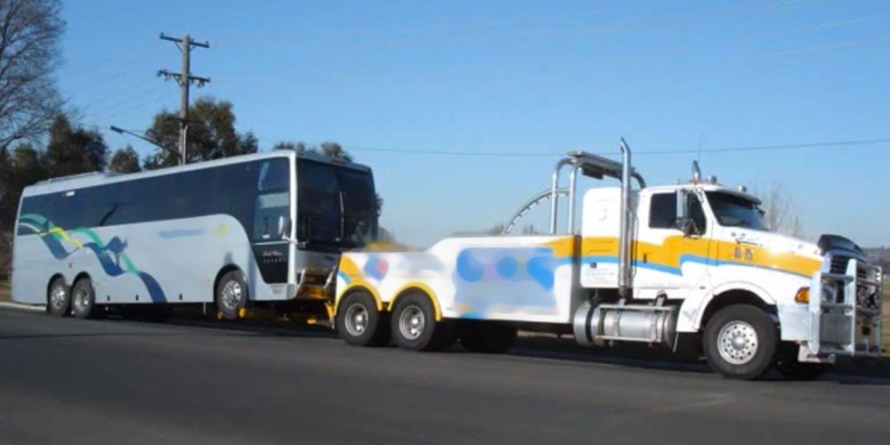 //centralcoasttowtruck.com.au/wp-content/uploads/2020/07/bus_towing.jpg